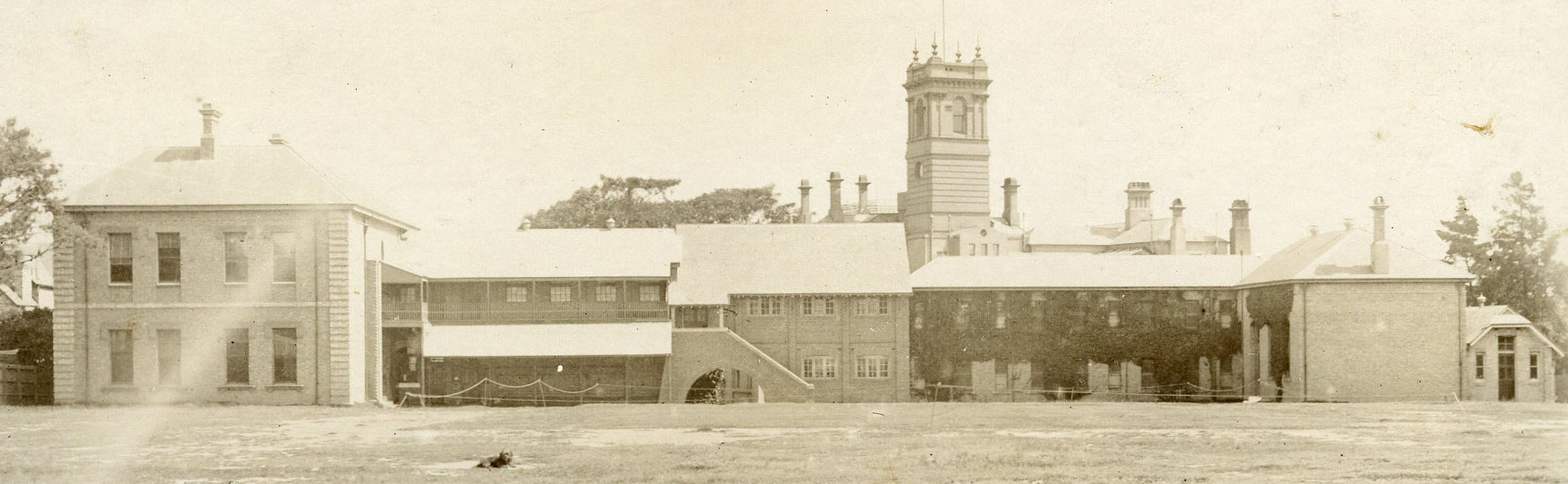 Banner photo - school buildings and oval 1910